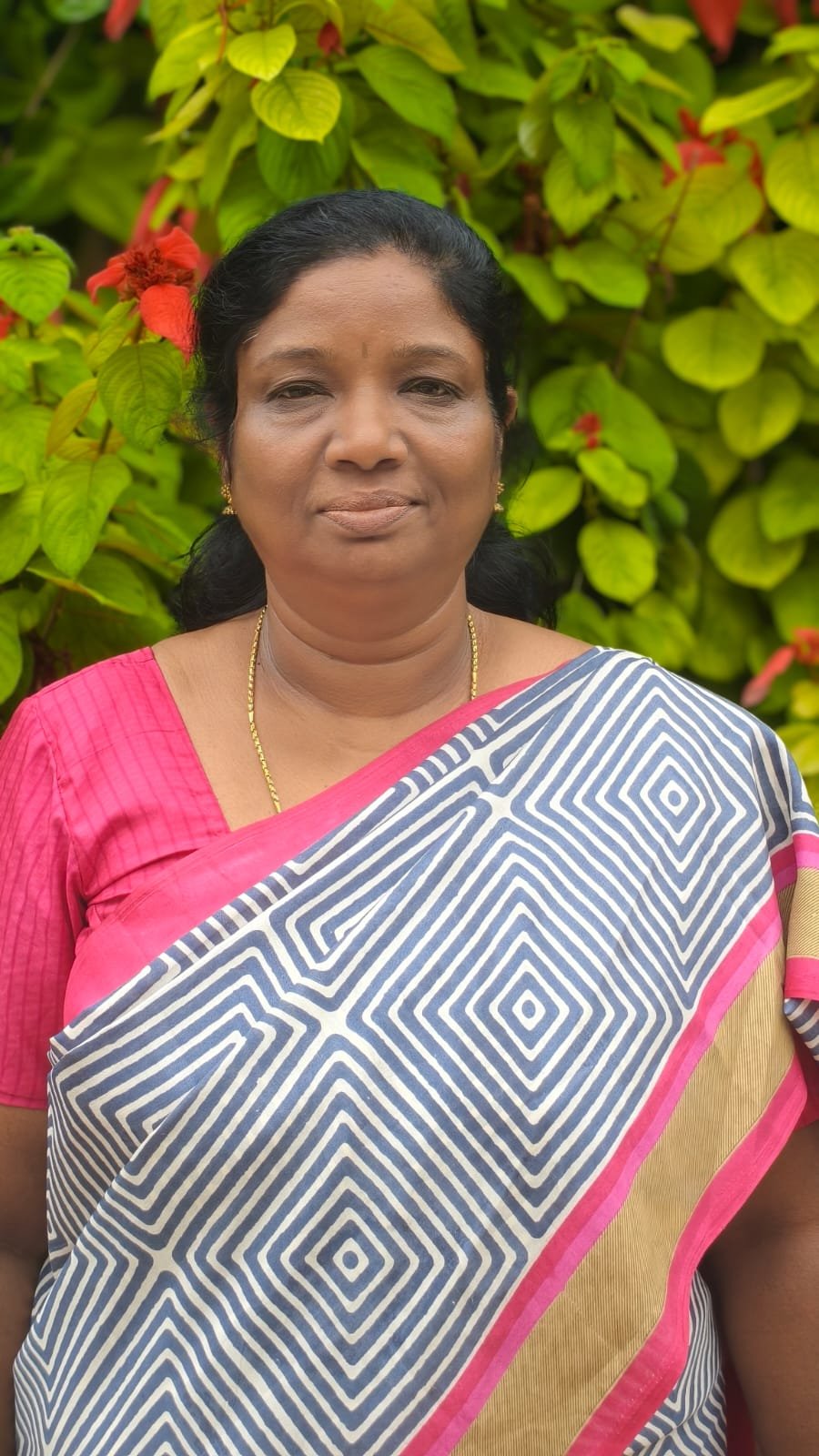 Mrs. Meena K